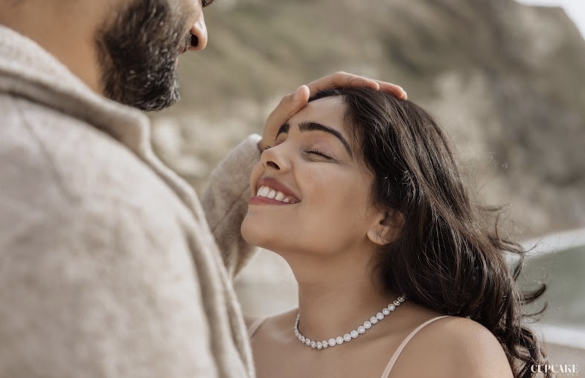 An intimate wedding portrait by the coast