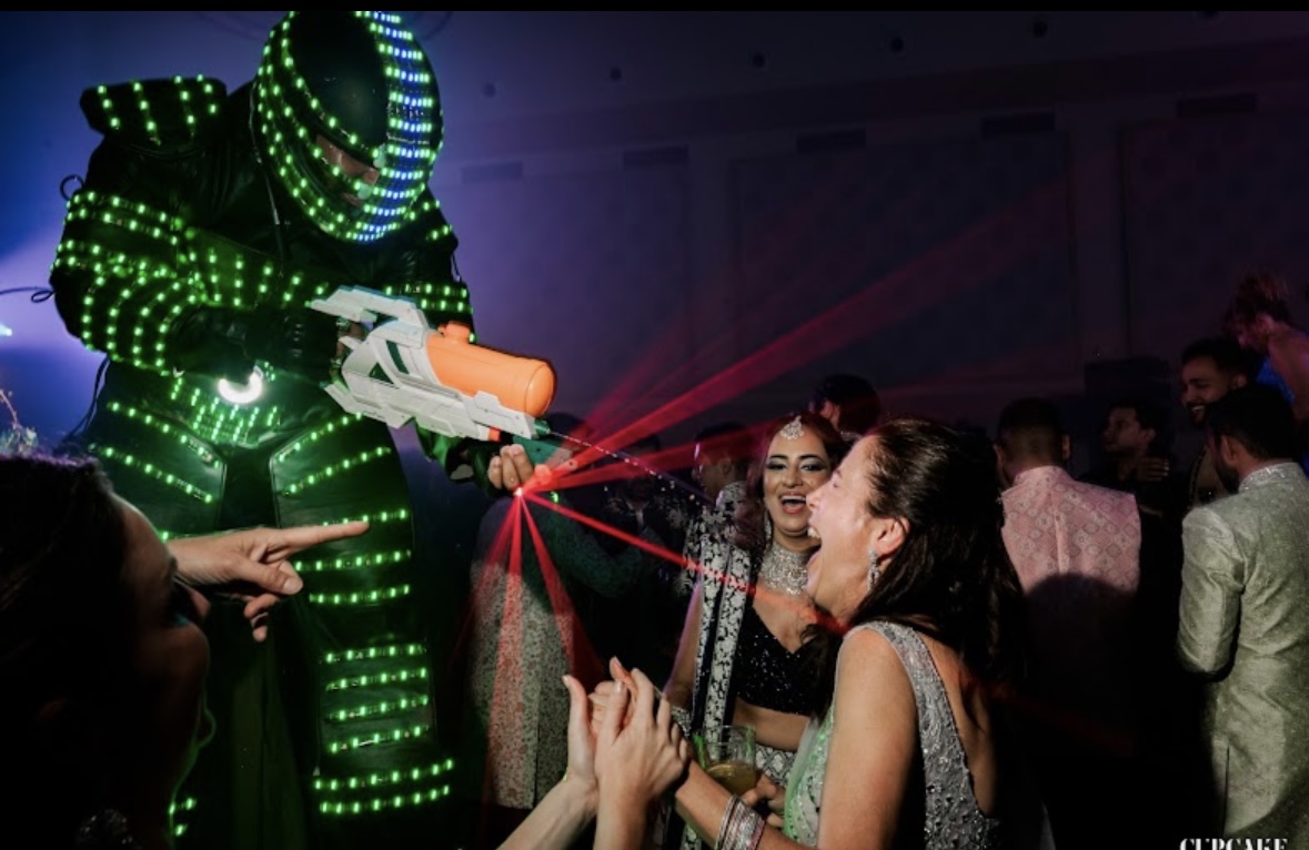 Guests celebrating on a lively wedding dance floor